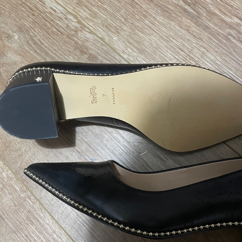 Black leather Coach shoes. Thick comfy heel. Only worn once